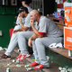 Pitcher Jonathan Broxton sits in the dugout after being pulled in the seventh inning of another Cardinals loss. Via Getty.